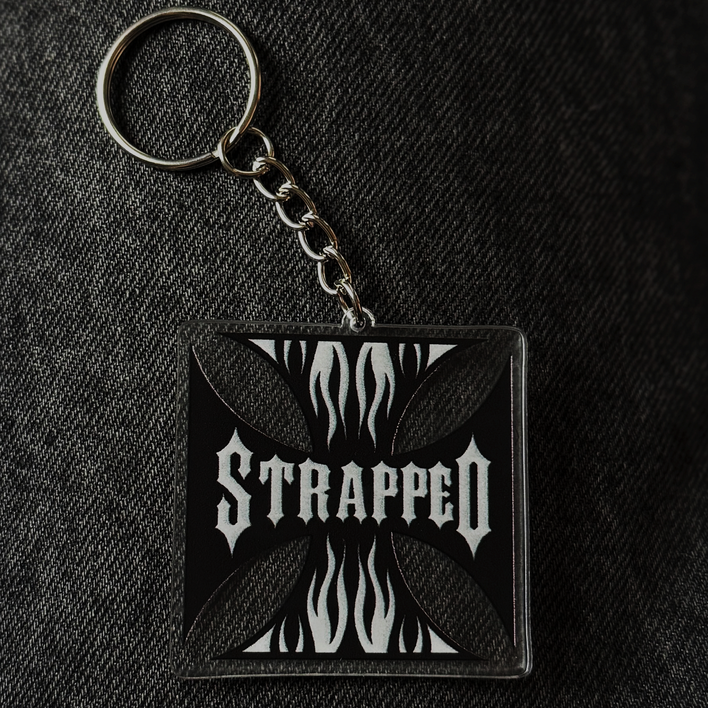 Strapped Cross Keychain