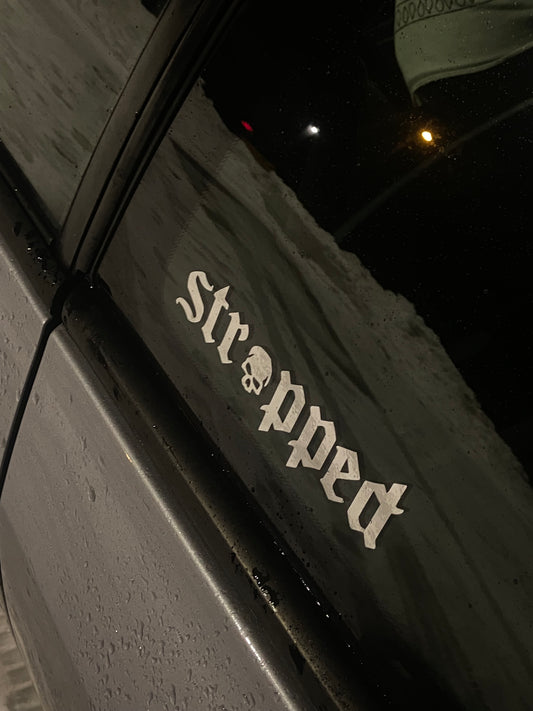 Strapped skull decal