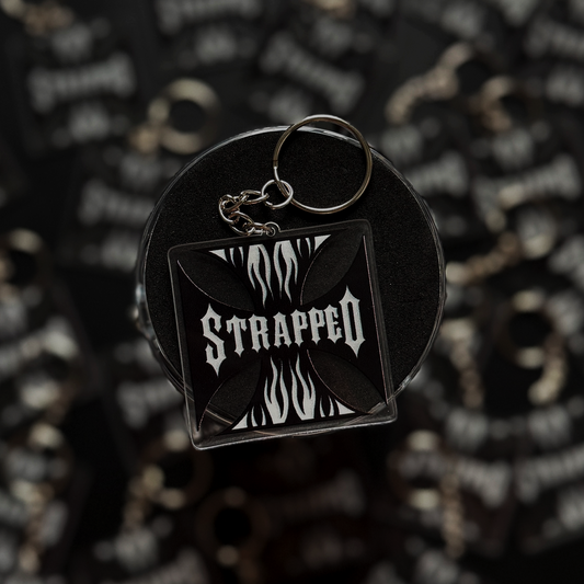 Strapped Cross Keychain